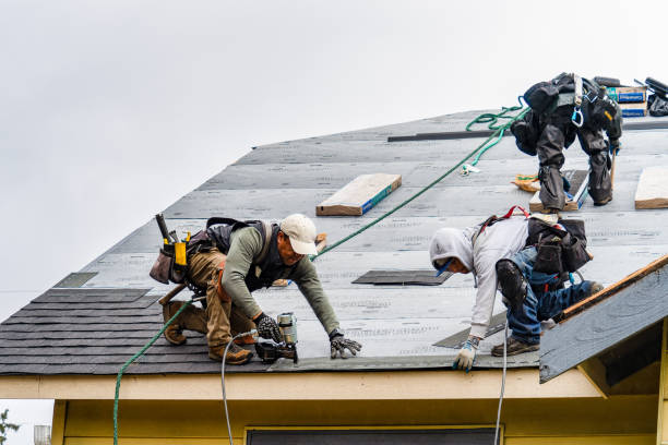 Professional Roofing technician working in East Derry, NH